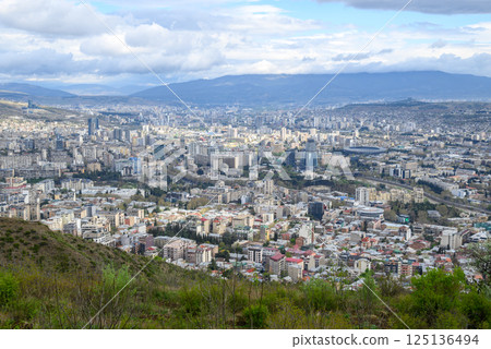 Cityscape of Tbilisi, capital of Georgia, aerial panoramic view from Mtatsminda Park Cityscape of Tbilisi, capital of Georgia, aerial panoramic view from Mtatsminda Park 125136494