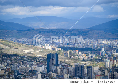 Cityscape of Tbilisi, capital of Georgia, aerial panoramic view from Mtatsminda Park Cityscape of Tbilisi, capital of Georgia, aerial panoramic view from Mtatsminda Park 125136502