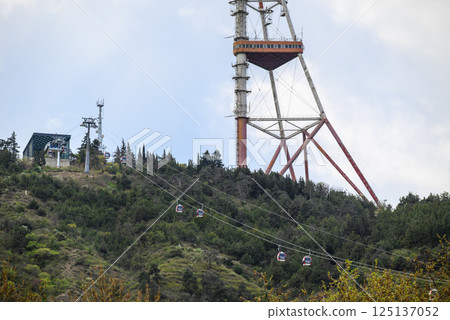 Cable cars to the Tbilisi TV broadcasting communications tower located in Mtatsminda Park above Tbilisi, capital of Georgia 125137052