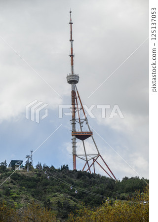 Cable cars to the Tbilisi TV broadcasting communications tower located in Mtatsminda Park above Tbilisi, capital of Georgia Cable cars to the Tbilisi TV broadcasting communications tower located in Mtatsminda Park above Tbilisi, capital of Georgia 125137053