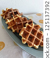 Freshly baked handmade waffles 125137392