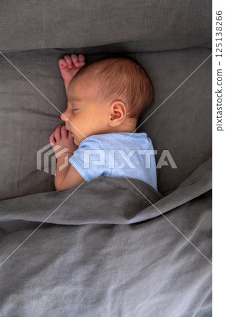 Mother and Baby Sleeping Peacefully Together 125138266