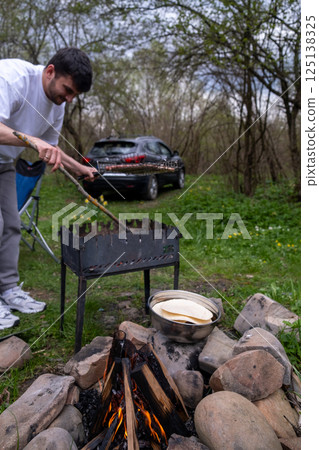 Outdoor Grilling and Camping in the Forest Outdoor Grilling and Camping in the Forest 125138325