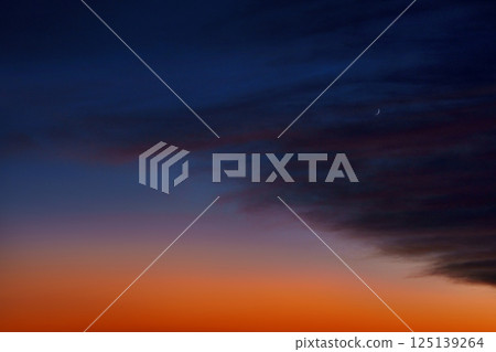 Dark purple sky at sunset. Saturated yellow sky. Lilac clouds. Universal photo. Feeling. Dark purple sky at sunset. Saturated yellow sky. Lilac clouds. Universal photo. Feeling. 125139264