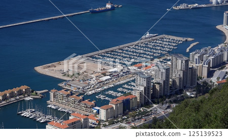 Ocean Village Marina and Residential Buildings Dominating Gibraltar's Coastline Ocean Village Marina and Residential Buildings Dominating Gibraltar's Coastline 125139523
