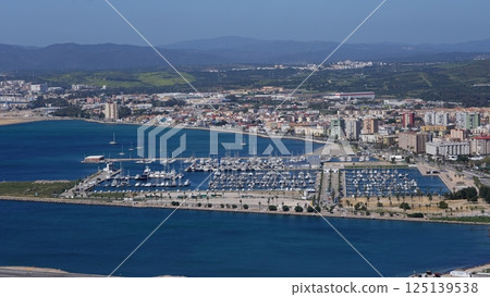 Aerial view of La Linea de la Concepcion with Alcaidesa Marina and Gibraltar in background Aerial view of La Linea de la Concepcion with Alcaidesa Marina and Gibraltar in background 125139538