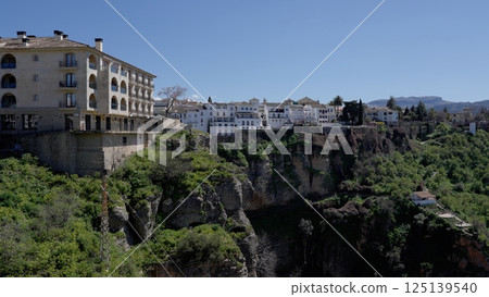 Ronda, Spain, cityscape overlooking El Tajo gorge Ronda, Spain, cityscape overlooking El Tajo gorge 125139540