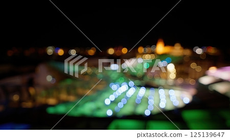 Defocused lights creating bokeh effect at night 125139647