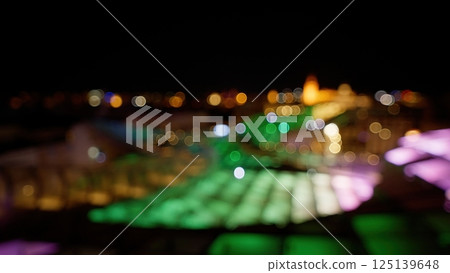 Defocused lights creating bokeh effect at night 125139648