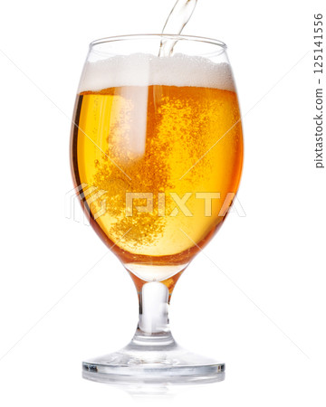 A glass of beer with a golden hue and frothy head, isolated on a clean white background A glass of beer with a golden hue and frothy head, isolated on a clean white background 125141556