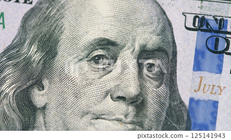 A CloseUp Image of a One Hundred Dollar Bill Emphasizing Financial Aspects and Focus A CloseUp Image of a One Hundred Dollar Bill Emphasizing Financial Aspects and Focus 125141943
