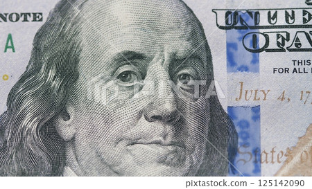 CloseUp of a U.S. One Hundred Dollar Bill Featuring the Renowned Benjamin Franklins Image 125142090