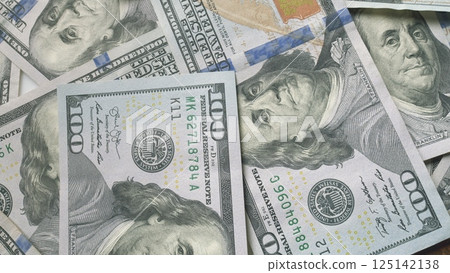 A detailed closeup view of American Dollars in multiple denominations is presented here A detailed closeup view of American Dollars in multiple denominations is presented here 125142138
