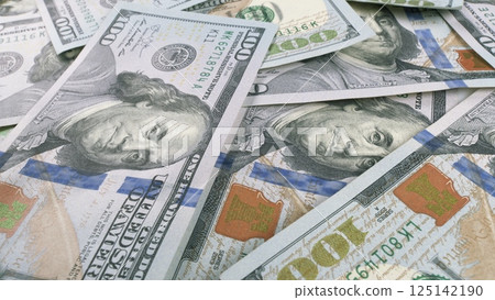 A variety of U.S. currency notes beautifully displayed and arranged on the surface A variety of U.S. currency notes beautifully displayed and arranged on the surface 125142190