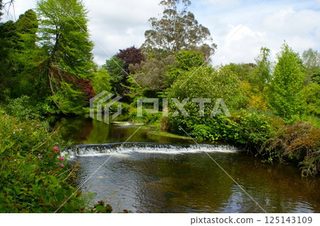 Landscape with a small waterfall. Ireland. 125143109