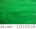 Green abstract background. Green canvas texture close-up. 125143114