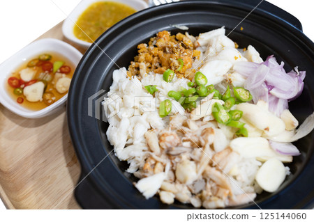 Top view of Crabmeat Curry with Fermented Rice Noodle, focus selective Top view of Crabmeat Curry with Fermented Rice Noodle, focus selective 125144060