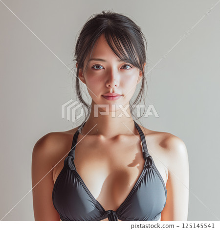 Woman in swimsuit studio shot 125145541