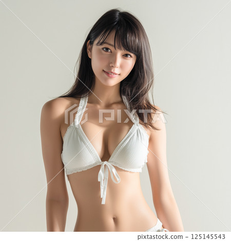 Woman in swimsuit studio shot 125145543
