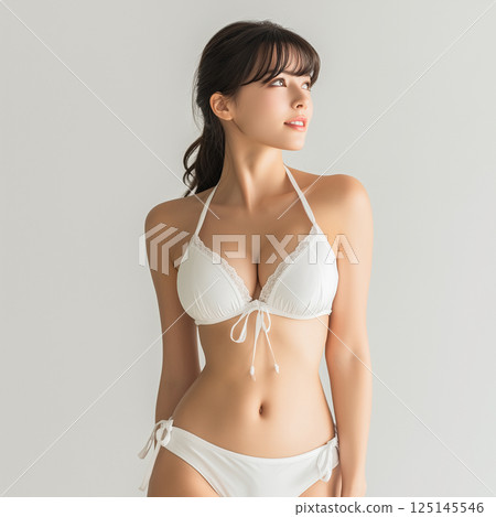 Woman in swimsuit studio shot 125145546