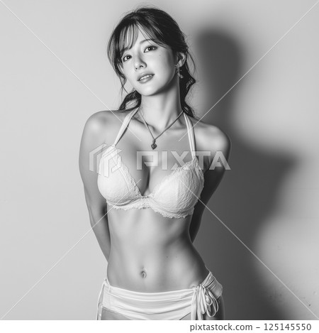 Woman in swimsuit studio shot 125145550