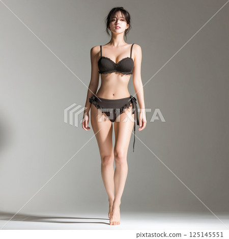 Woman in swimsuit studio shot 125145551