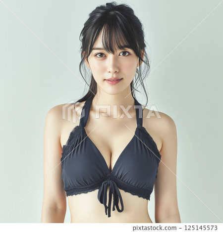 Woman in swimsuit studio shot 125145573