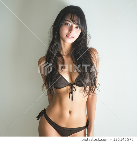 Woman in swimsuit studio shot 125145575