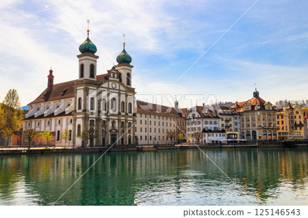 View of Jesuit church and the Reuss river in Lucerne, Switzerland View of Jesuit church and the Reuss river in Lucerne, Switzerland 125146543