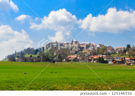 View of old Swiss town Romont, built on a rock prominence, in Freibourg canton, Switzerland View of old Swiss town Romont, built on a rock prominence, in Freibourg canton, Switzerland 125146550