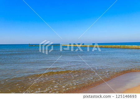 Wooden breakwater in the Baltic sea, Poland Wooden breakwater in the Baltic sea, Poland 125146693