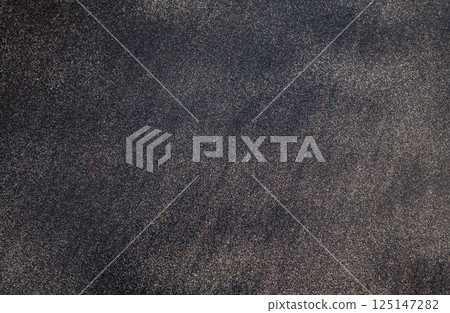 Black sand on a beach in Tenerife at Canary Islands 125147282