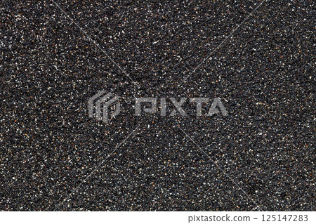 Black sand on a beach in Tenerife at Canary Islands 125147283