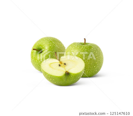 Green apples and a half isolated. Green apple and a slice with droplets. Green apples and a half isolated. Green apple and a slice with droplets. 125147610