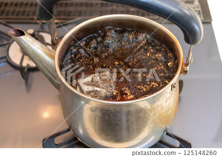 boil tea in a kettle boil tea in a kettle 125148260