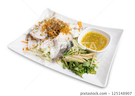 Top view of Steam Red Snapper fillet with seafood spicy dipping , focus selective Top view of Steam Red Snapper fillet with seafood spicy dipping , focus selective 125148907