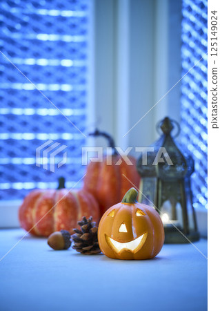 Halloween image of a decorated window at night Halloween image of a decorated window at night 125149024