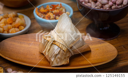 Traditional Taiwanese Zongzi and various ingredients on display 125149155