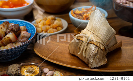 Traditional Taiwanese Zongzi and various ingredients on display 125149161