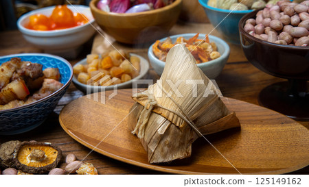 Traditional Taiwanese Zongzi and various ingredients on display 125149162