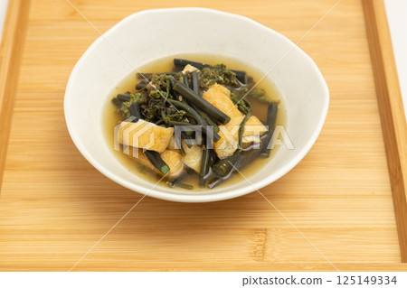 Spring wild bracken simmered with lightly fried tofu Spring wild bracken simmered with lightly fried tofu 125149334