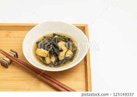 Spring wild bracken simmered with lightly fried tofu Spring wild bracken simmered with lightly fried tofu 125149337