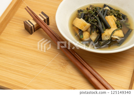 Spring wild bracken simmered with lightly fried tofu Spring wild bracken simmered with lightly fried tofu 125149340