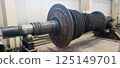 Industrial medium pressure turbine rotor in a workshop. Mechanical engineering. Power engineering. 125149701