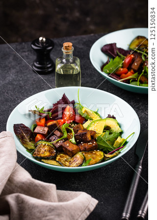 Healthy vegan keto salad with tofu and avocado Healthy vegan keto salad with tofu and avocado 125150834