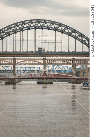 Stunning view of the Newcastle upon tyne with Tyne bridge, Swing bridge and The High level bridge spanning the River Tyne. Stunning view of the Newcastle upon tyne with Tyne bridge, Swing bridge and The High level bridge spanning the River Tyne. 125152043