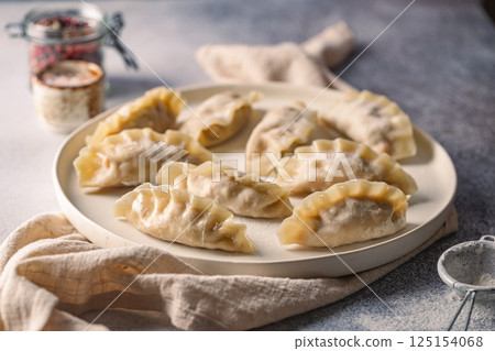 Asian raw dumplings Asian raw dumplings 125154068