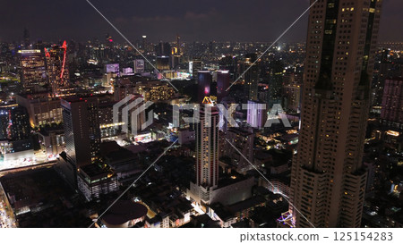 Skyscrapers in Bangkok city at night Skyscrapers in Bangkok city at night 125154283