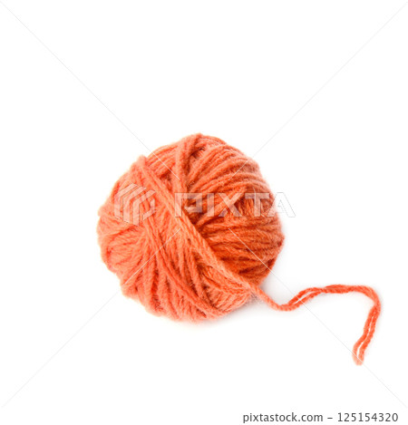 Ball of terracotta yarn isolated on white. Ball of terracotta yarn isolated on white. 125154320