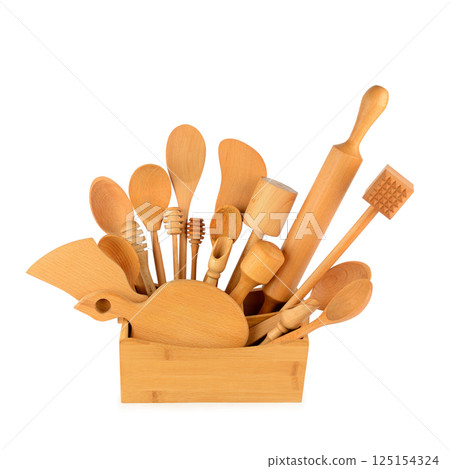 Set of wooden kitchen utensils isolated on white. 125154324